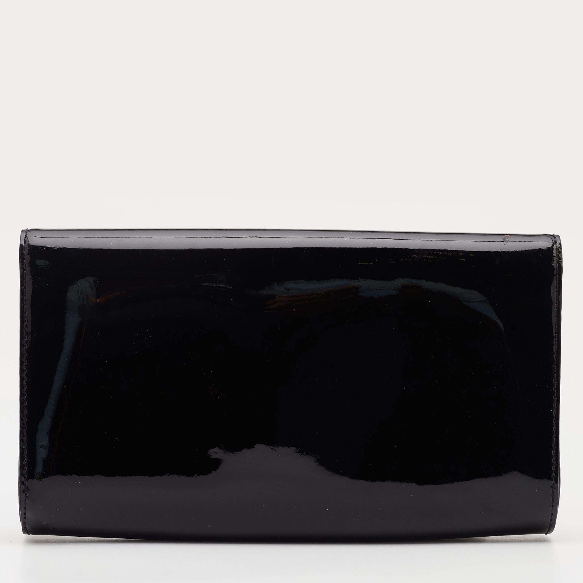 The Louise clutch from Louis Vuitton is as elegant as it can get. Designed in sleek black-hued leather, the clutch is beautiful. The iconic LV logo in gold-tone metal adorns the outer flap and the fabric interior makes it functional.

Includes: