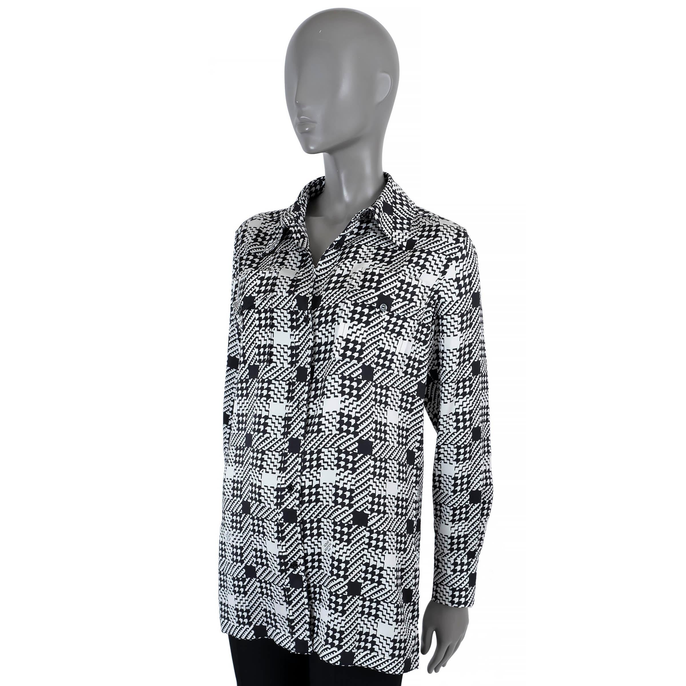 100% authentic Louis Vuitton button-down shirt in white silk (100%) with black geometric print. Features two chest pockets and a point collar. Closes with buttons on the front. Unlined. Has been worn and is in excellent condition. 

2018 Fall/Winter