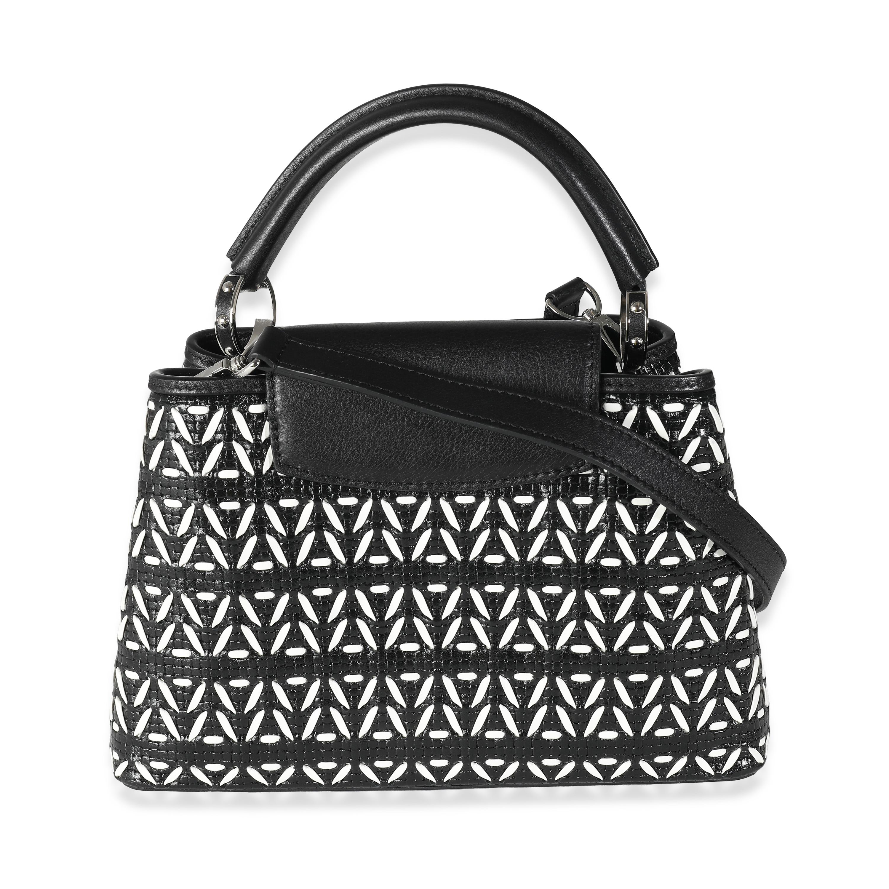 Listing Title: Louis Vuitton Black White Woven Calfskin Tressage Capucines BB
SKU: 141105
MSRP: 4800.00 USD
Condition: Pre-owned 
Condition Description: The Louis Vuitton Capucines bag was created with the brand's house codes in mind. Encapsulating