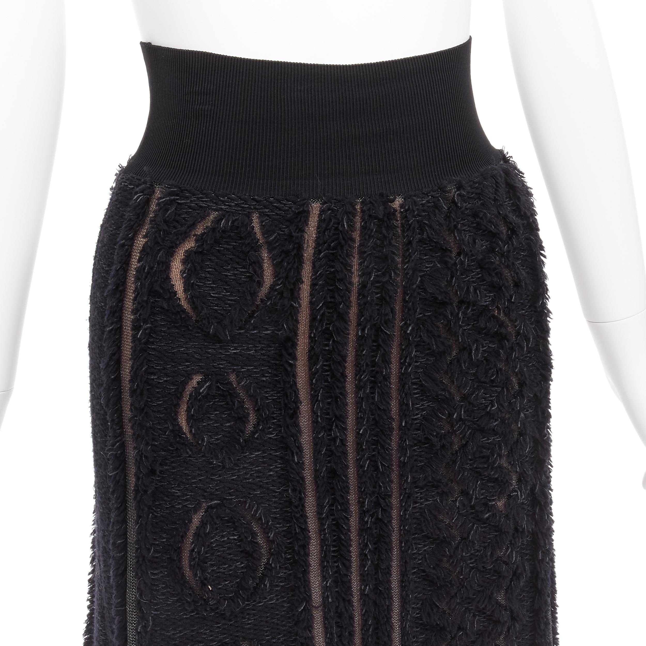 LOUIS VUITTON black wool blend grey lucid mesh cutout knit knee skirt XS
Reference: TGAS/D00164
Brand: Louis Vuitton
Designer: Nicolas Ghesquiere
Material: Wool, Viscose, Polyamide
Color: Black, Grey
Pattern: Solid
Closure: Elasticated
Lining: Nude