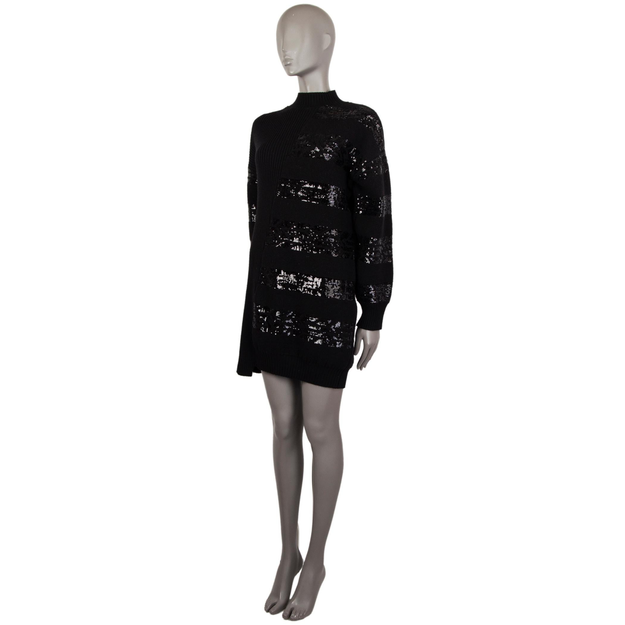 Louis Vuitton ribbed-knit sweater dress in black wool (81%), viscose (15%), and nylon (4%). With mock neck and sequins embellsihments. Unlined. Has been worn and is in excellent condition.

ag Size M
Size M
Shoulder Width 57cm (22.2in)
Bust 120cm