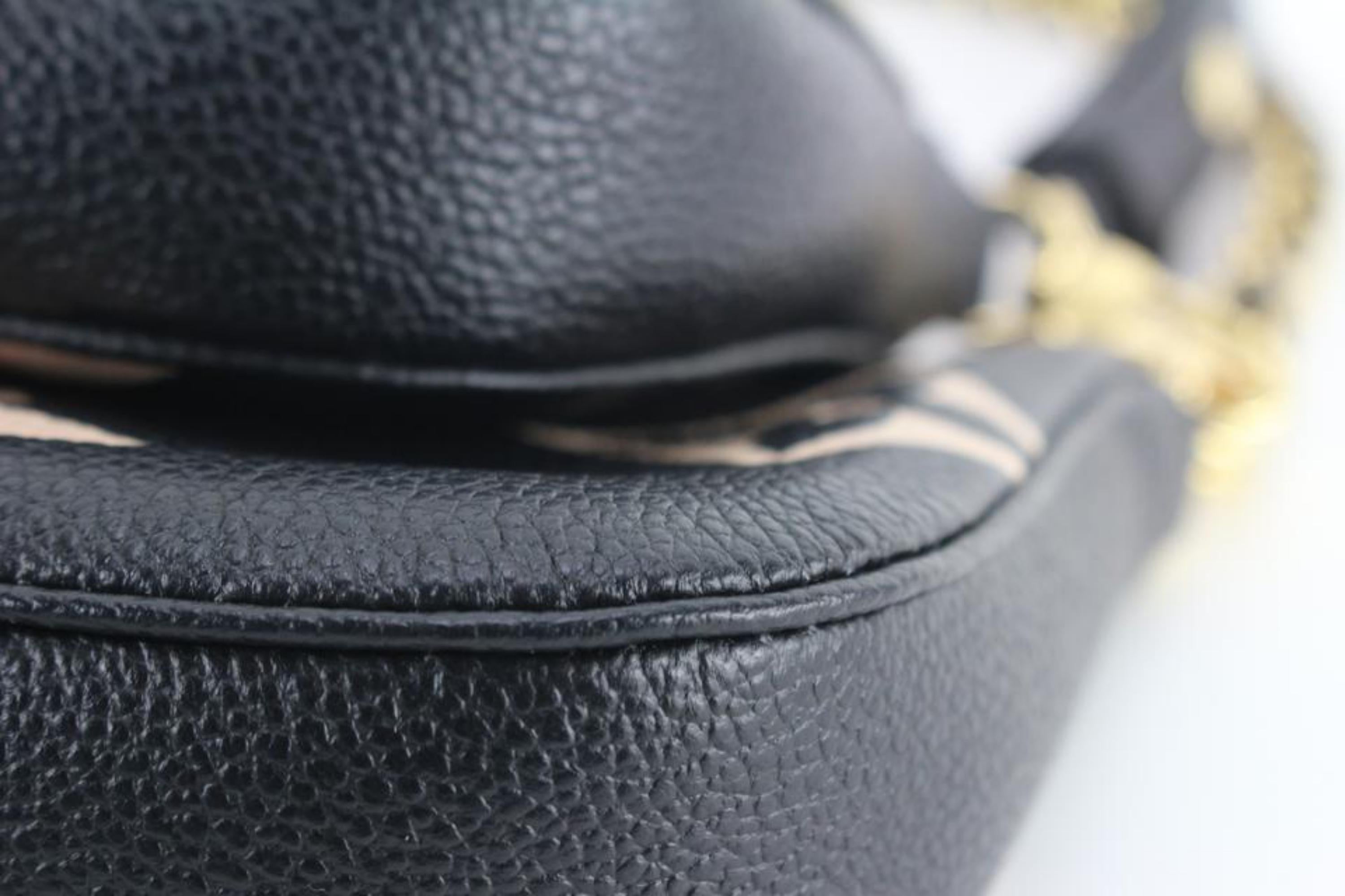 Noir Louis Vuitton - Pochette multi-pochette Empreinte en cuir noir et beige avec monogramme 24lk810s en vente