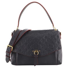 Louis Vuitton Blanche Handtasche mit Monogramm Empreinte Leder MM