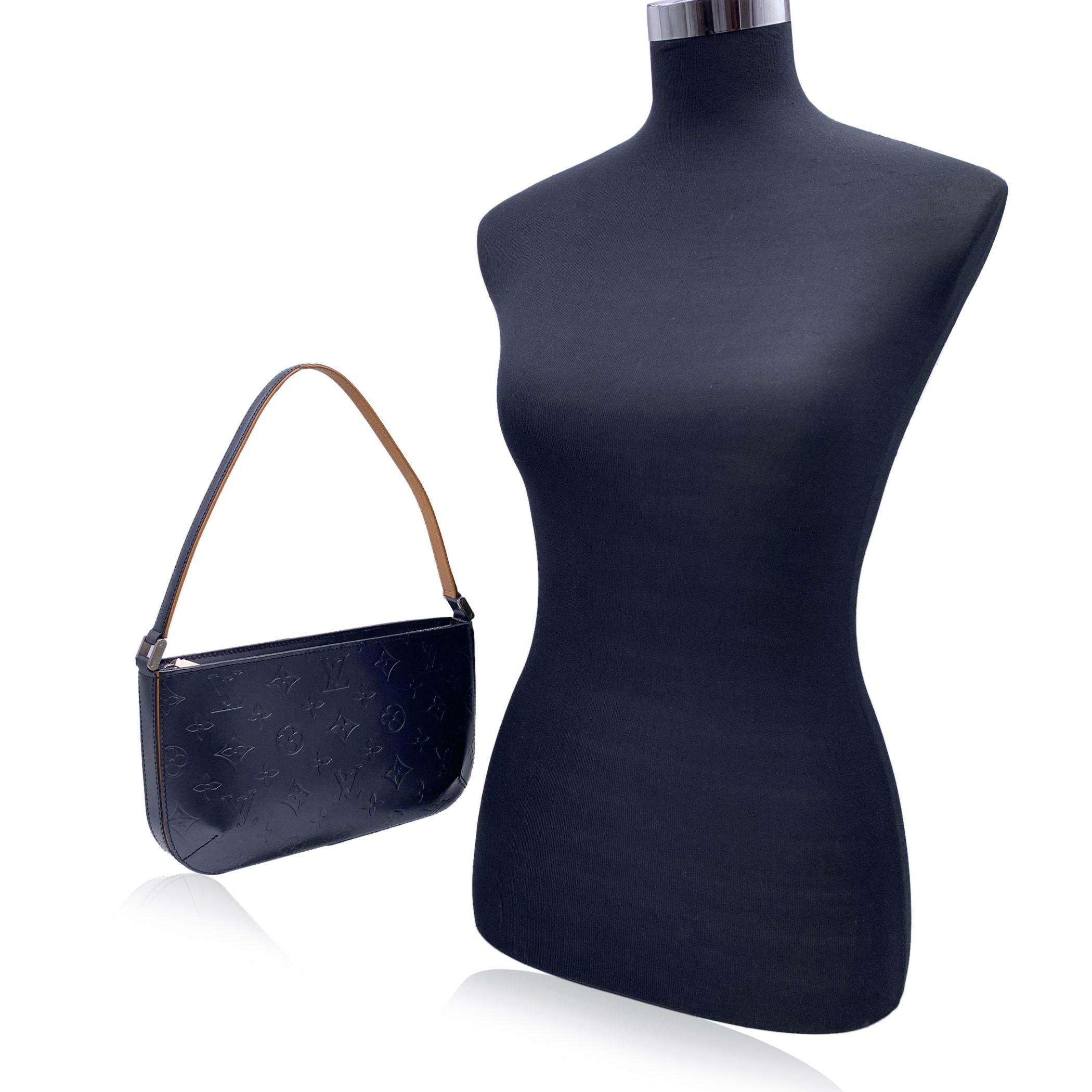 Louis Vuitton Monogram Mat 'Fowler' bag. Blue 'Bleu' color. Monogram Mat matte-finished metallic leather. The Louis Vuitton Monogram Mat is a limited edition collection that is no longer sold in stores. Natural leather trim and shoulder strap.