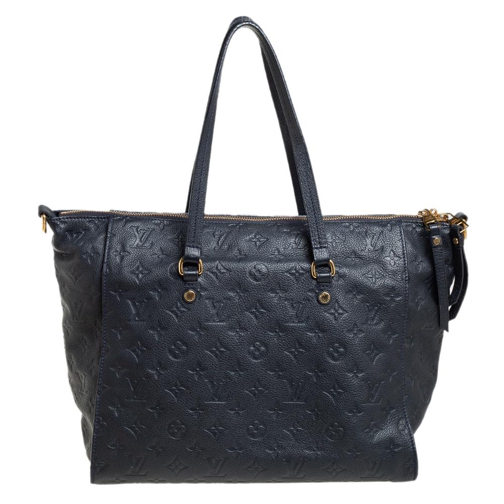 Louis Vuitton's handbags are popular owing to their high style and functionality. This Lumineuse bag, like all the other handbags, is durable and stylish. Crafted from Monogram Empreinte leather, the bag comes with two flat top handles, a front