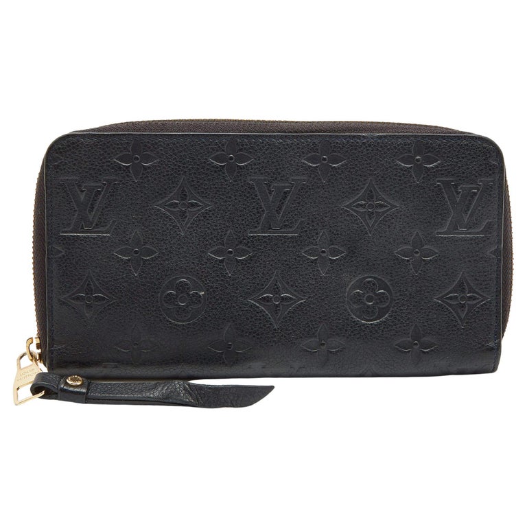 Louis Vuitton Cream Leather Zippy Wallet at 1stDibs