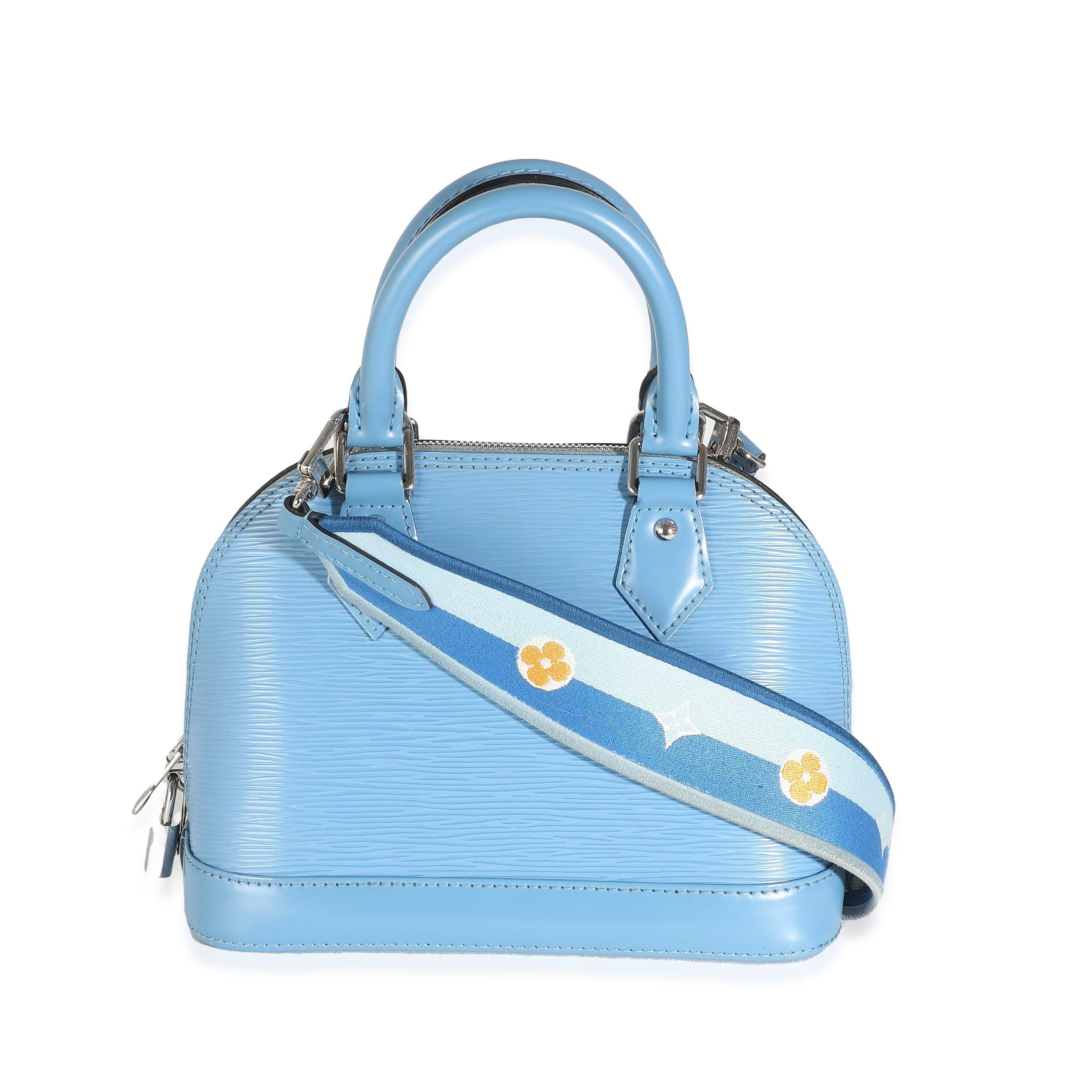 Listing Title: Louis Vuitton Bleuet Epi Jacquard Alma BB
SKU: 143199
MSRP: 2370.00 USD
Condition: Pre-owned 
Condition Description: Introduced in 1992, the history of the Alma bag from Louis Vuitton actually goes back way further in time. The tote