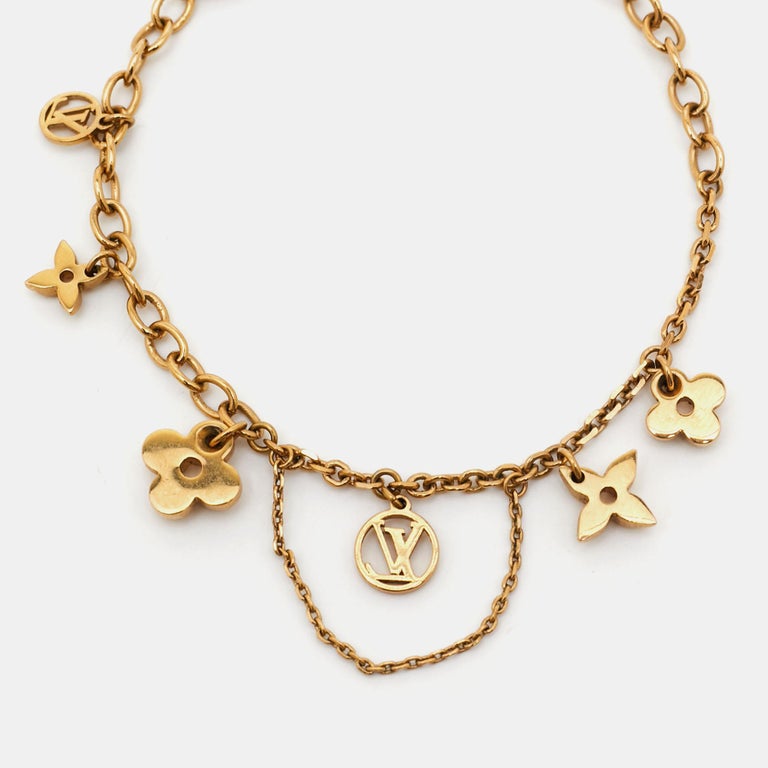 Louis Vuitton Blooming Supple Gold Tone Charm Bracelet Louis Vuitton | The  Luxury Closet