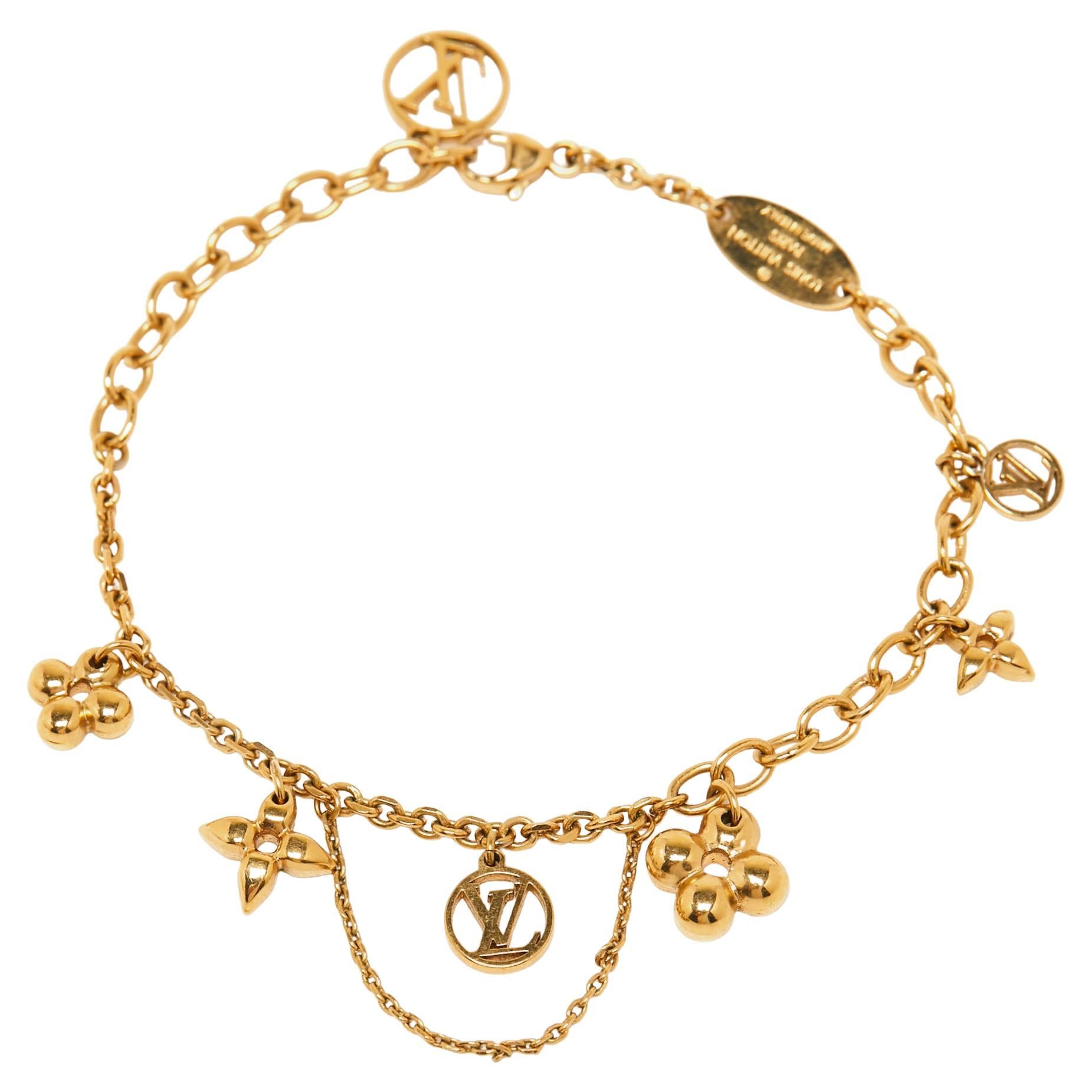 Louis Vuitton 18k Gold Gemstone Charm Bracelet at 1stDibs  louis vuitton  bracelet with charms, lv bracelet charms, louis vuitton charm bracelet