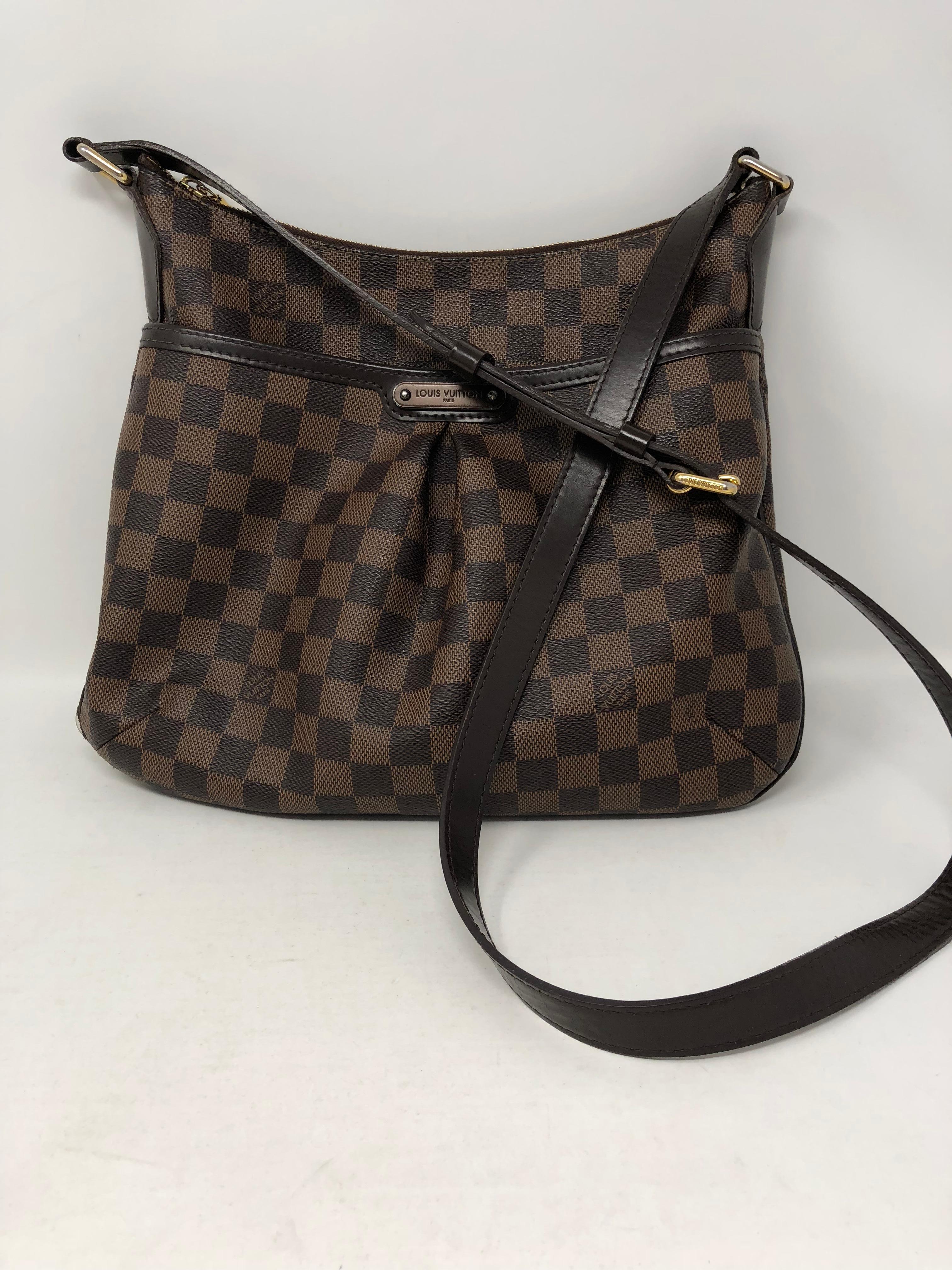 Louis Vuitton Damier Ebene Bloomsbury GM Crossbody bag. Discontinued style from LV and in damier ebene pattern. Has a front pocket to hold more. Good condition. Light wear inside. Guaranteed authentic. 