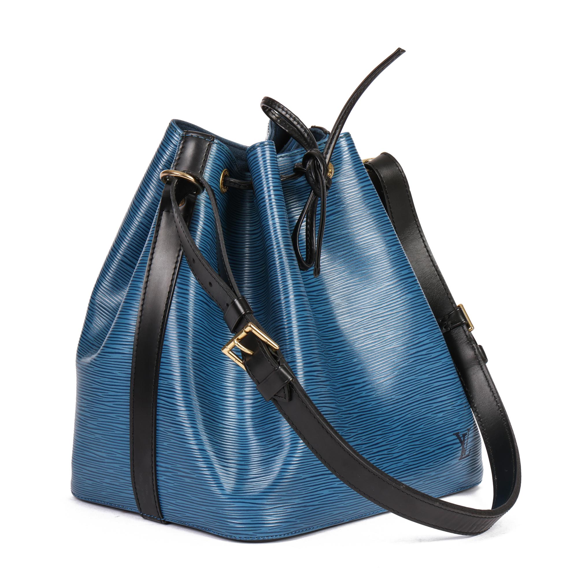 LOUIS VUITTON
Blue & Black Epi Leather Vintage Petit Noé

Xupes Reference: HB4842
Serial Number: AR1905
Age (Circa): 1995
Accompanied By: X
Authenticity Details: Date Stamp (Made in France)
Gender: Ladies
Type: Shoulder

Colour: Blue,