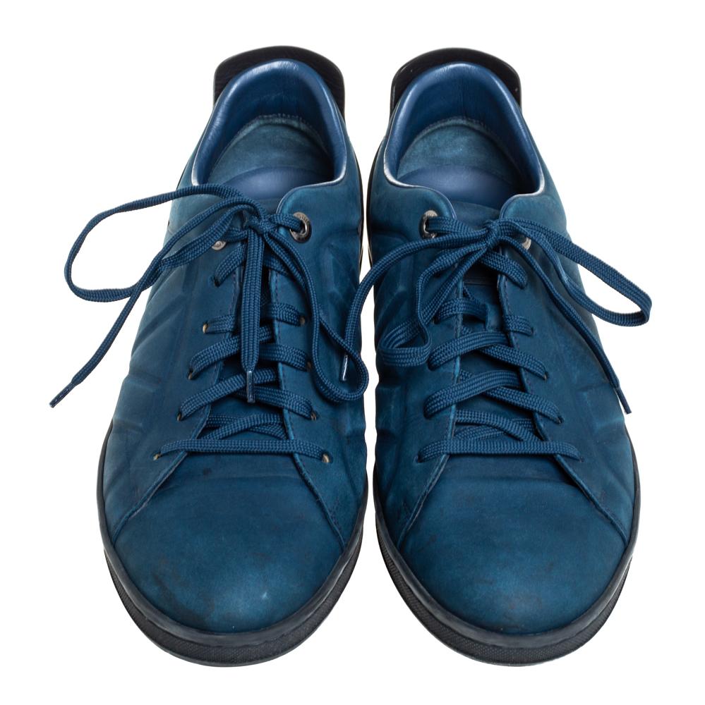 The sneakers from the house of Louis Vuitton are minimally designed into a classic silhouette. Rendered in leather and nubuck, they feature round toes, laces on the vamps, and tough rubber soles for maximum grip. Wear the sneakers with your casual