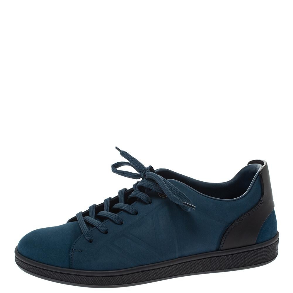 A pair of suede and leather sneakers to lend one all the comfort in this world. These rubber sole sneakers will give you ease in every step. Designed by Louis Vuitton, they come in blue and black with lace-up on the vamps. They will amp up your
