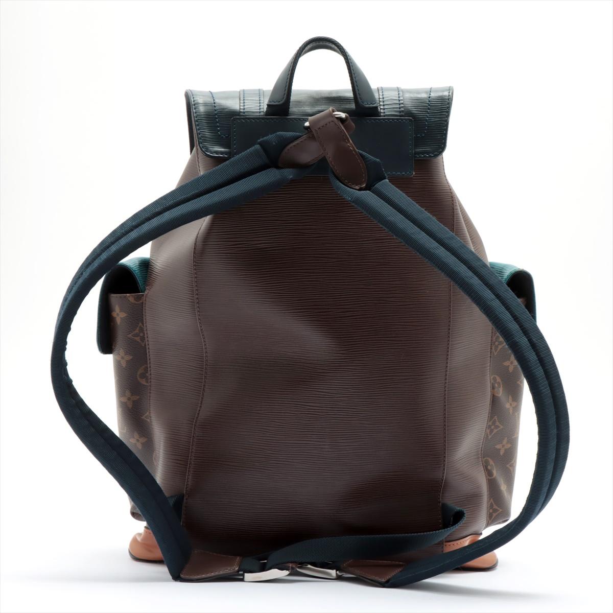 Blue Epi leather and brown monogram coated canvas Louis Vuitton Christopher PM backpack with silver-tone hardware, blue leather trim, dual buckles on top of the front flap, single top handle, dual adjustable shoulder straps, dual exterior flap