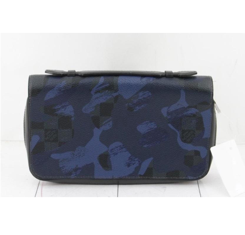Men's navy and black Damier Cobalt coated canvas with camouflage printed motif Louis Vuitton Zippy XL wallet with silver-tone hardware, single leather top handle, black matte leather trim, black leather lining, four compartments; one with zip