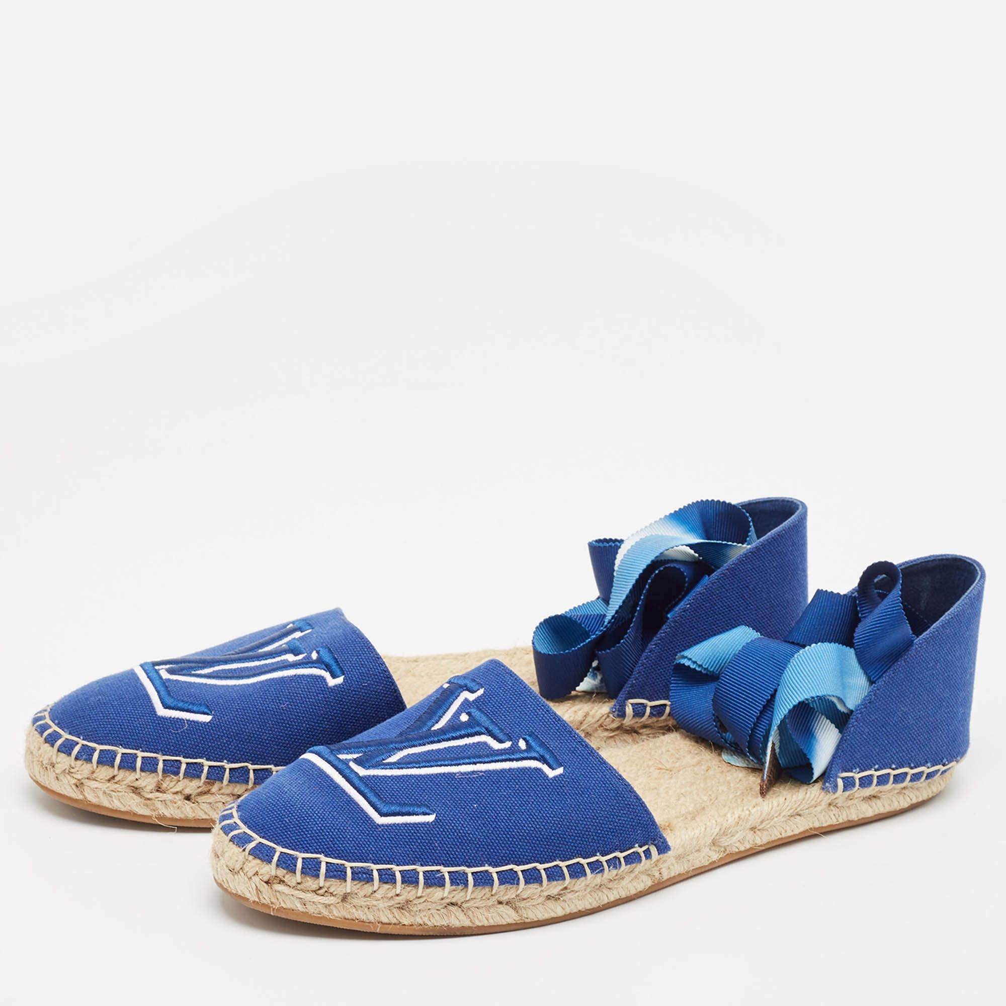 Frame your feet with these LV flat espadrilles. Created using the best materials the flats are perfect with short midi and maxi hemlines.