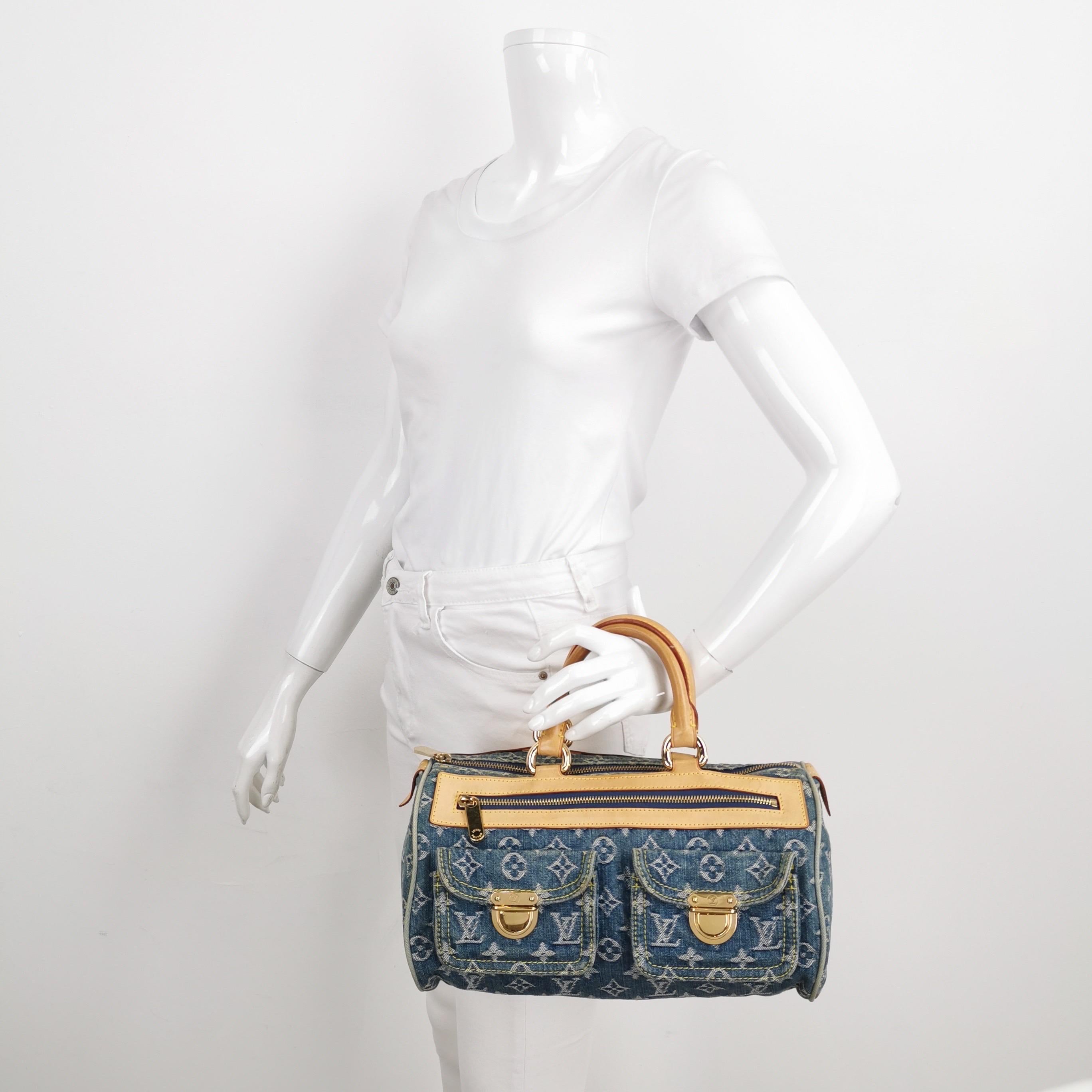 Louis Vuitton Denim Neo Speedy Boston Bag
 These are professional photos of the actual bag.
 Light wash blue monogram denim Louis Vuitton Neo Speedy with brass hardware, tan vachetta leather trim, dual rolled top handles, three exterior pockets; one