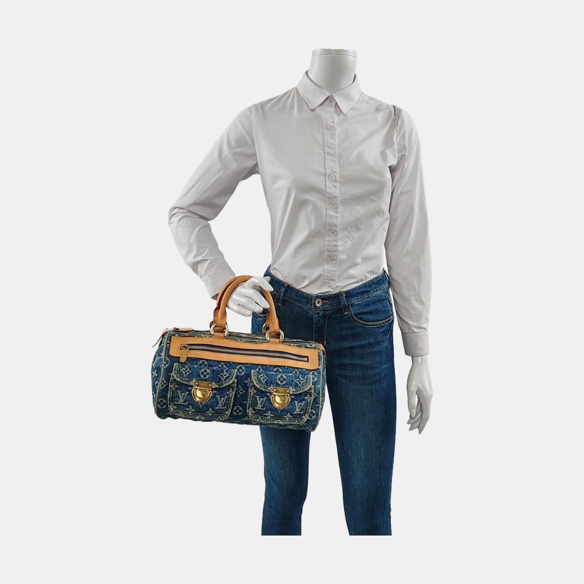 Louis Vuitton Denim Neo Speedy Boston Bag
 These are professional photos of the actual bag.
 Light wash blue monogram denim Louis Vuitton Neo Speedy with brass hardware, tan vachetta leather trim, dual rolled top handles, three exterior pockets; one