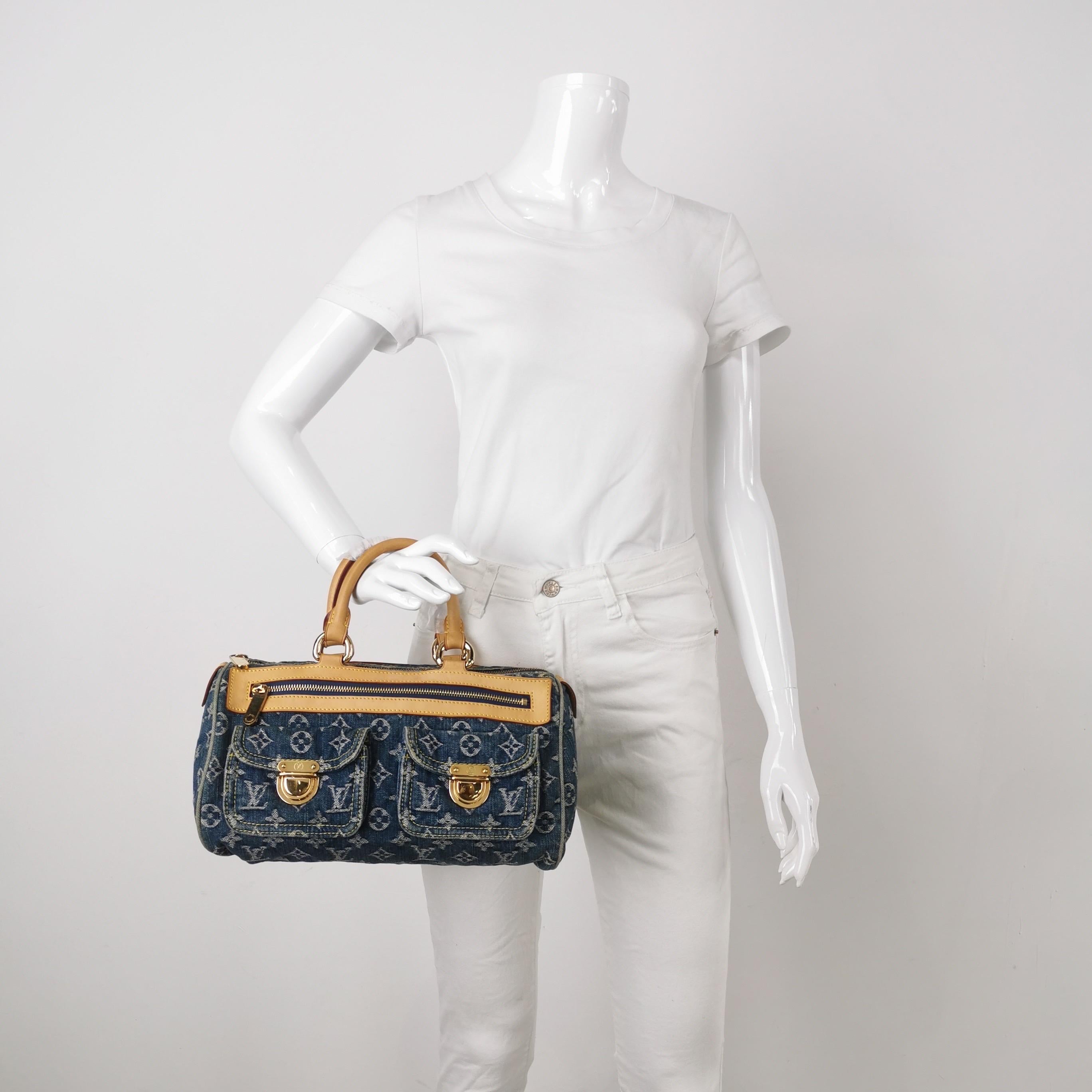 Louis Vuitton Denim Neo Speedy Boston Bag
 These are professional photos of the actual bag.
 Light wash blue monogram denim Louis Vuitton Neo Speedy with brass hardware, tan vachetta leather trim, dual rolled top handles, three exterior pockets; one
