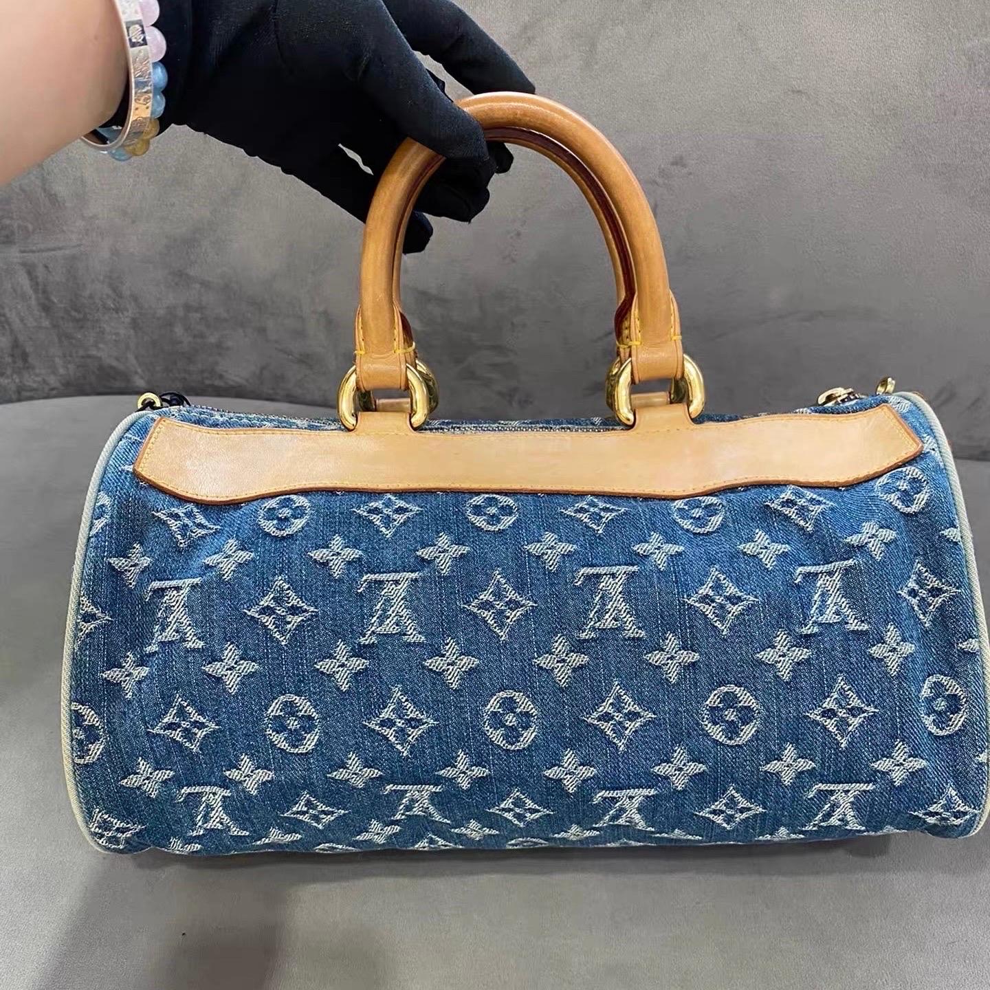 Louis Vuitton Denim Neo Speedy Boston Bag
 These are professional photos of the actual bag.
 Light wash blue monogram denim Louis Vuitton Neo Speedy with brass hardware, tan vachetta leather trim, dual rolled top handles, three exterior pockets; one