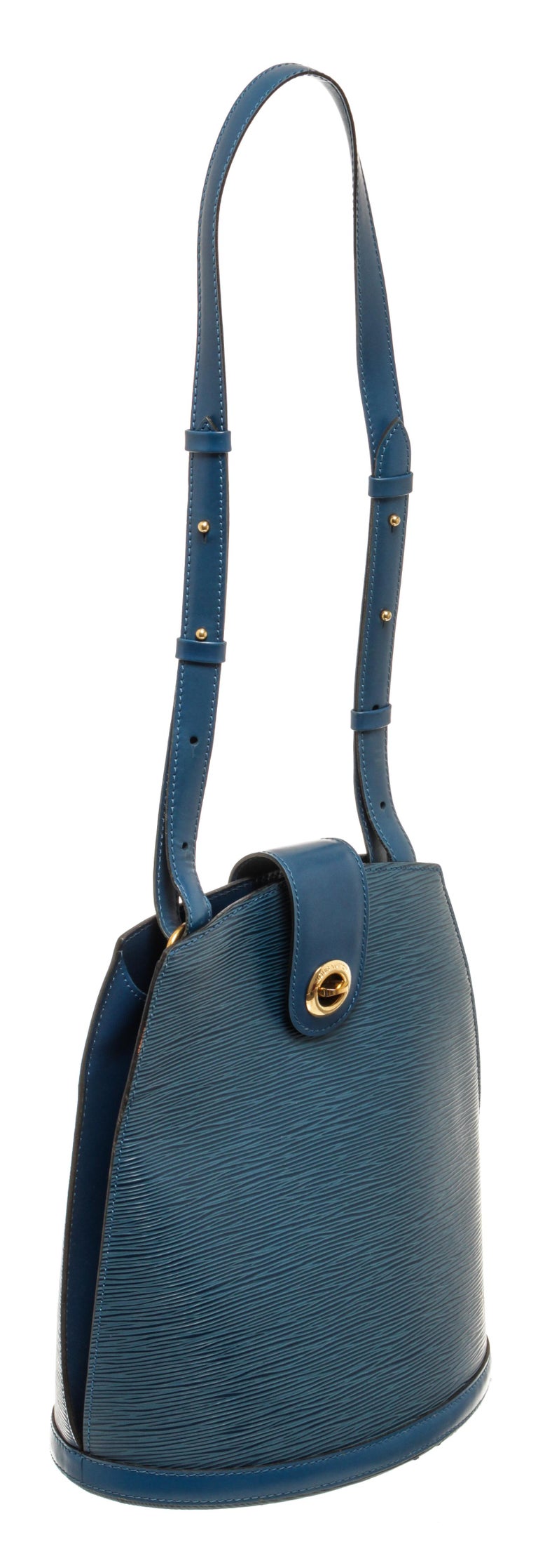 Louis Vuitton Blue Epi Cluny with adjustable shoulder strap, suede lining, interior pocket, gold tone hardware and turn lock closure

76926MSC