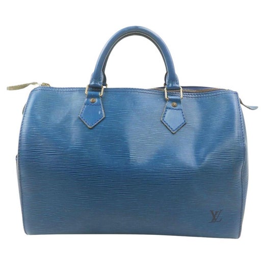 Louis Vuitton Blue Epi Leather Keepall 55 cm Duffle Bag Luggage at 1stDibs