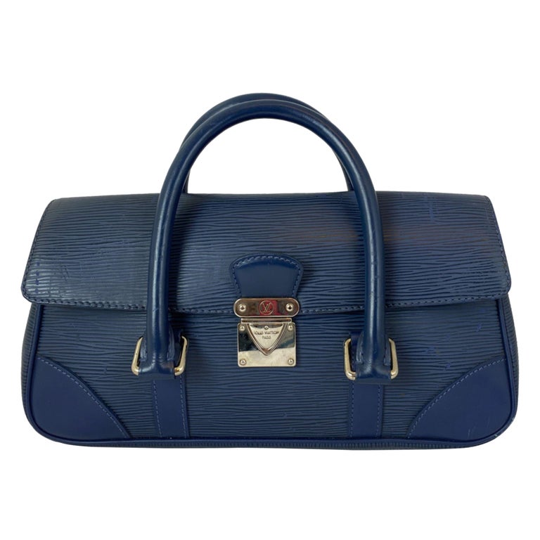 At Auction: Louis Vuitton, Louis Vuitton Blue Epi Leather Saint Jacques Bag