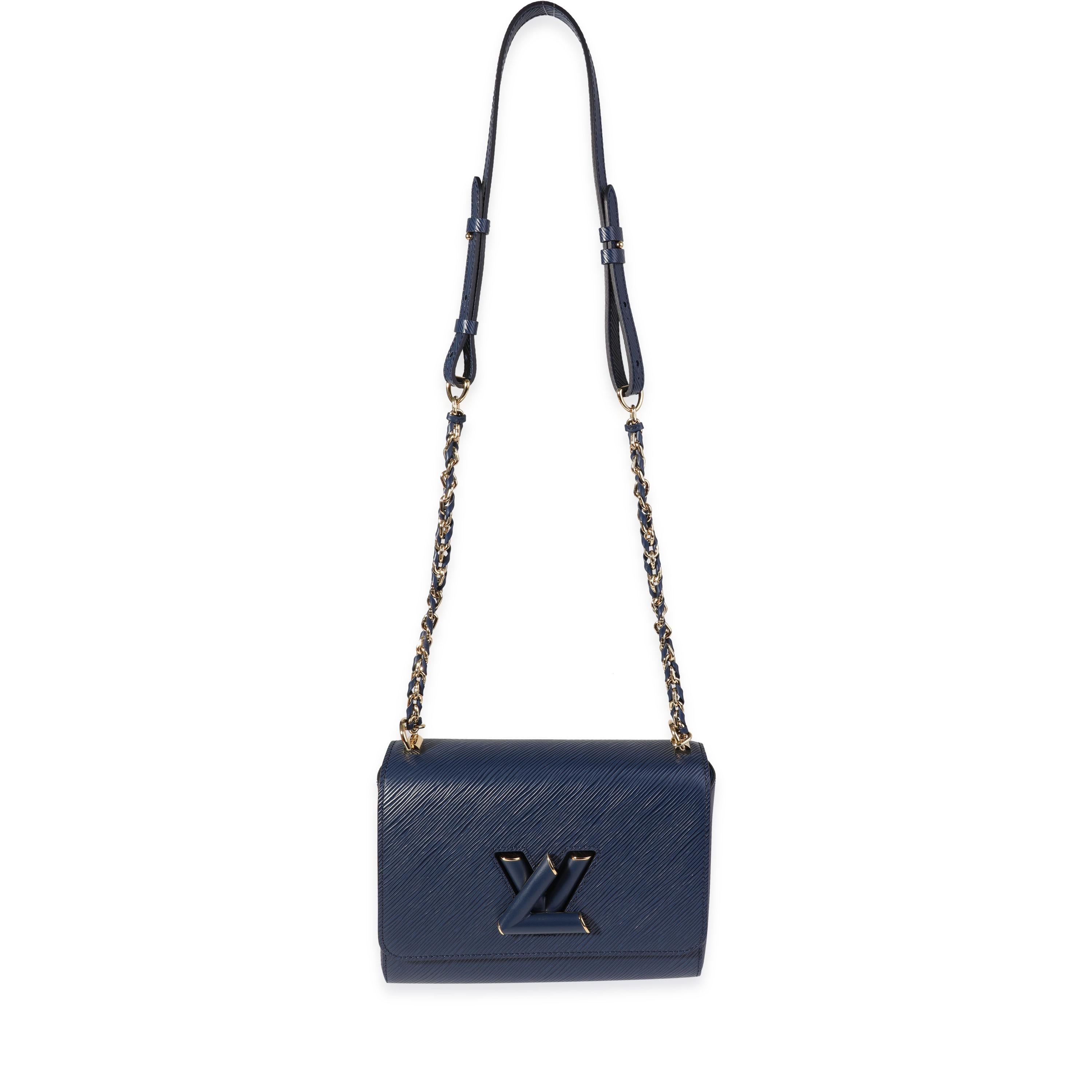 Listing Title: Louis Vuitton Blue Epi Twist MM Crossbody
SKU: 121130
MSRP: 4700.00
Condition: Pre-owned 
Handbag Condition: Excellent
Condition Comments: Excellent Condition. Light Scratching to hardware. Minor scuffing to suede. No other visible