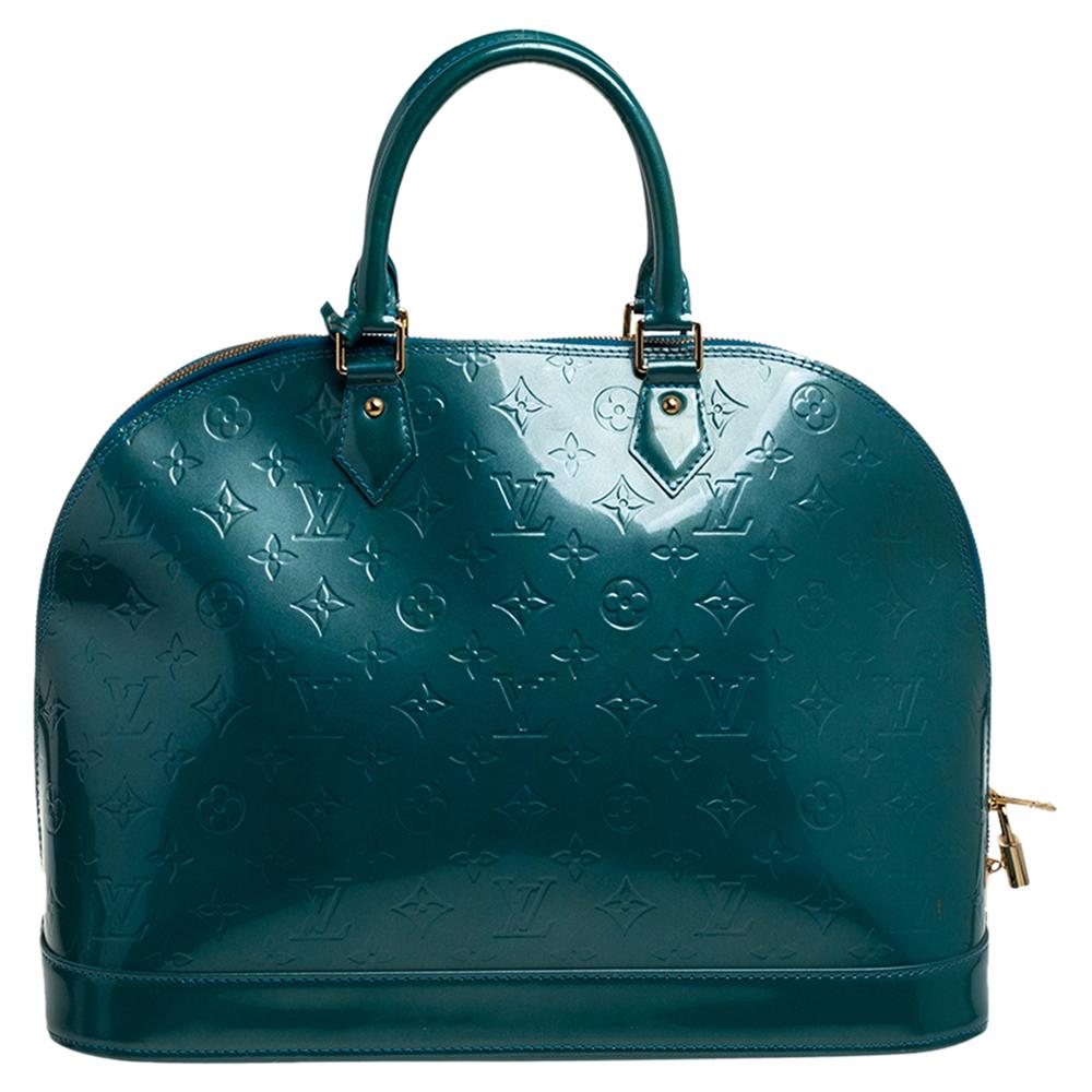 Out of all the irresistible handbags from Louis Vuitton, the Alma is the most structured one. First introduced in 1934 by Gaston-Louis Vuitton, the Alma is a classic that has received love from fashion icons. This piece comes crafted from Monogram