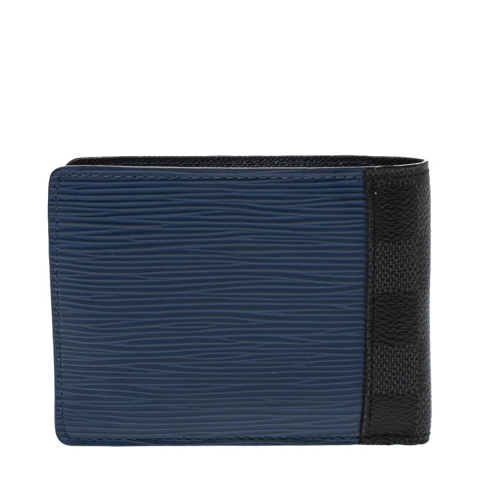 This wallet from Louis Vuitton brings along a touch of luxury and immense style. It comes crafted from a combination of signature Damier Graphite printed and epi leather and is designed as a bifold with the brand logo embossed on the front. It is