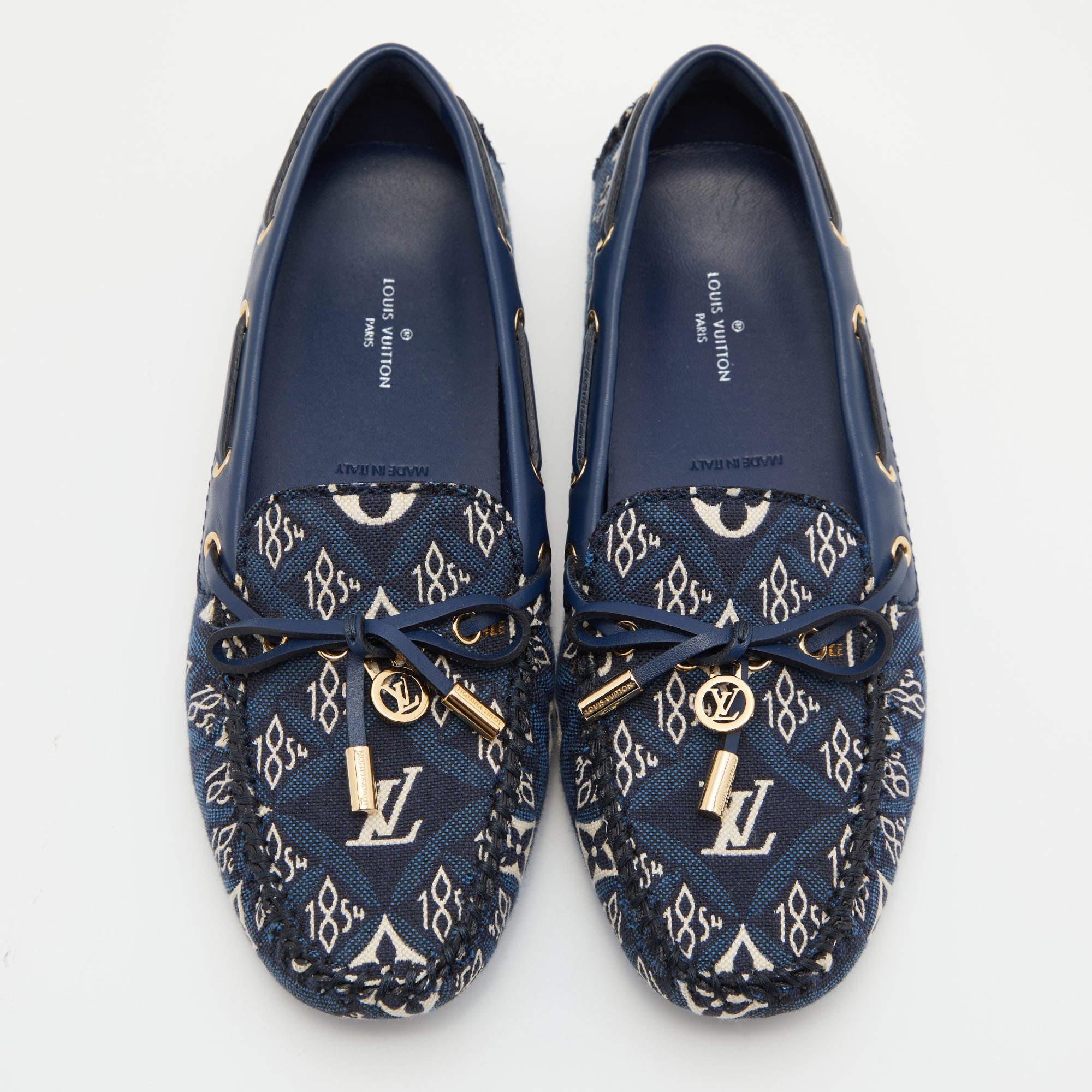 To perfectly complement your attires, Louis Vuitton brings you this pair of loafers that speak nothing but style. They have been crafted from Monogram canvas and styled with ties on the front. The comfortable loafers are easy to slip on, and they