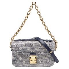 Bolso Louis Vuitton Pochette Azul Monograma Lienzo Metis Este Oeste
