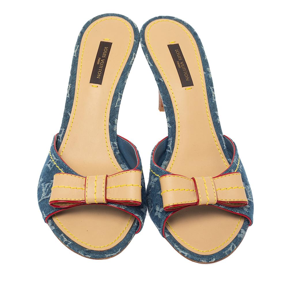 From the house of Louis Vuitton, these sandals are beautifully designed. This classic pair in monogram denim will match well with almost all your outfits. The slide sandals feature a leather bow detail, high heels, and comfortable leather-lined