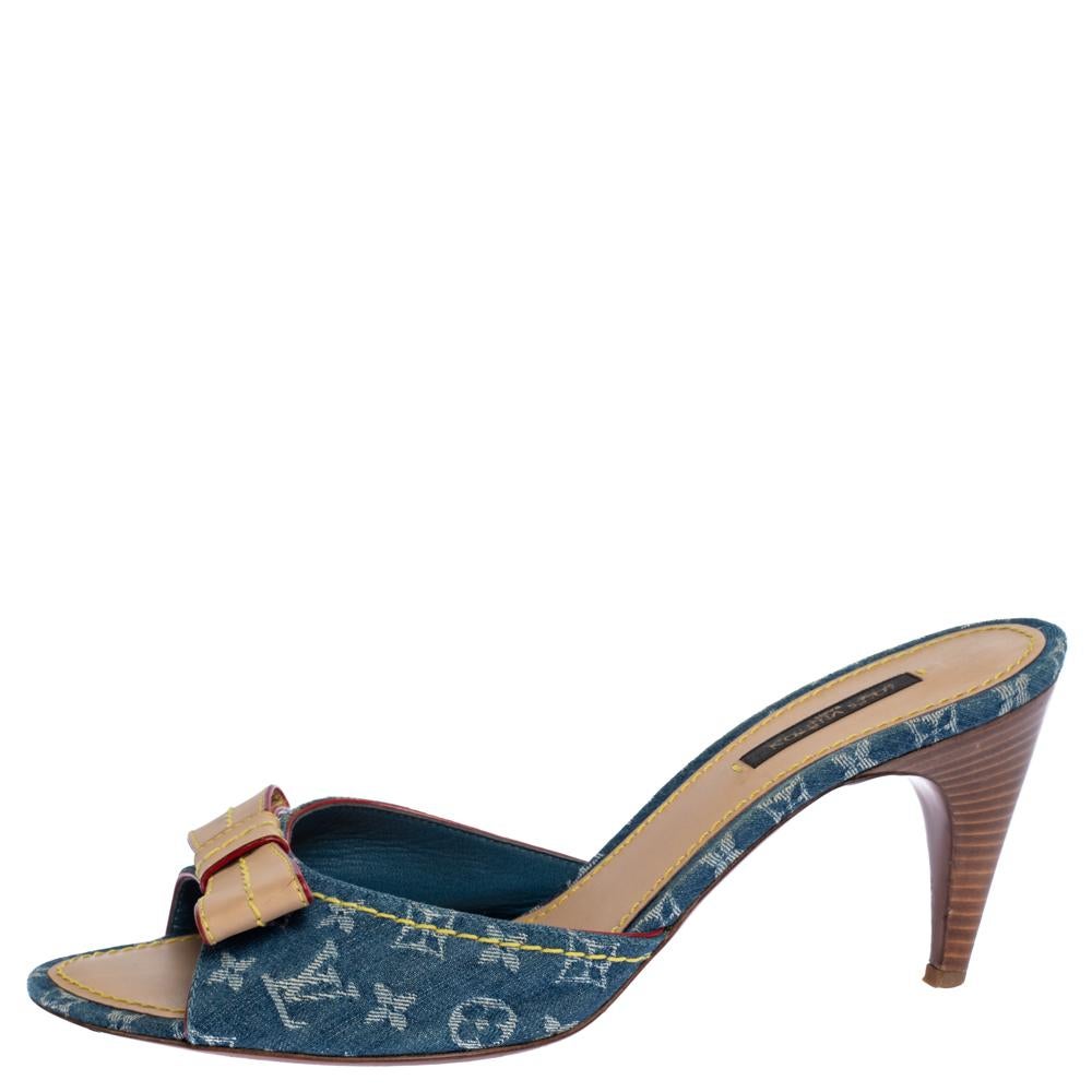 From the house of Louis Vuitton, these sandals are beautifully designed. This classic pair in monogram denim will match well with almost all your outfits. The slide sandals feature a leather bow detail, high heels and comfortable leather-lined