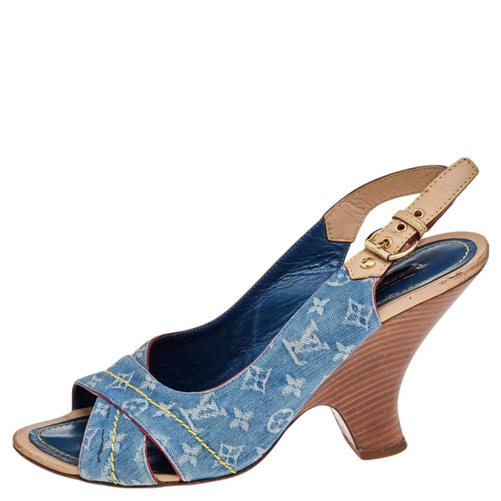 Crafted from blue monogrammed denim and leather, these stylish and modern sandals come from Louis Vuitton. They feature open toes, crisscross straps on the vamps, and slingback straps with buckle fastening. The insoles are leather-lined and the pair