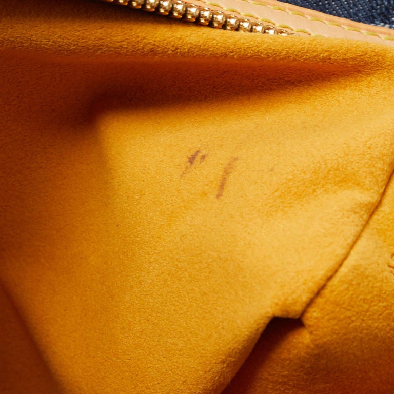 Louis Vuitton Limited Edition Blue Denim Monogram Denim Porte Epaule Raye  GM Bag - Yoogi's Closet
