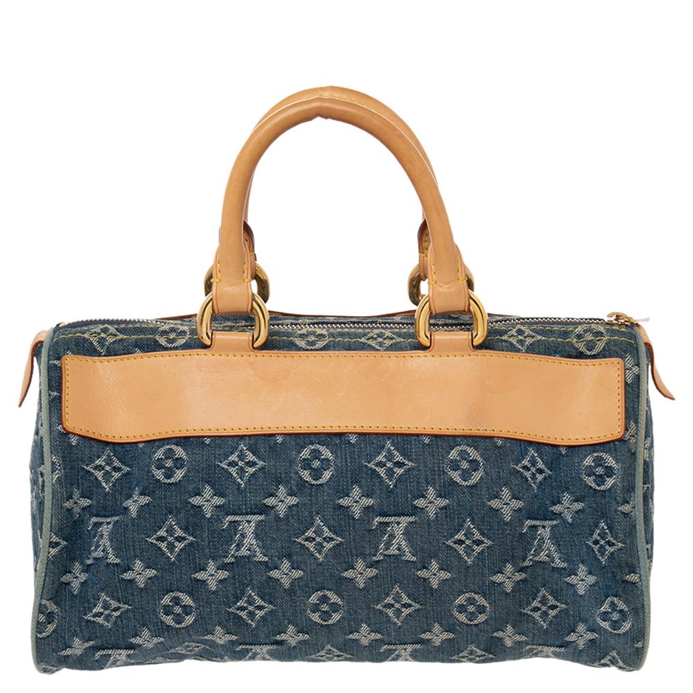 This Louis Vuitton Neo Speedy is a must-have. A traditional style that takes you back to the 1960s, Speedy was one of the first bags made by Louis Vuitton for everyday use. Crafted from denim in their classic monogram print, the bag features two