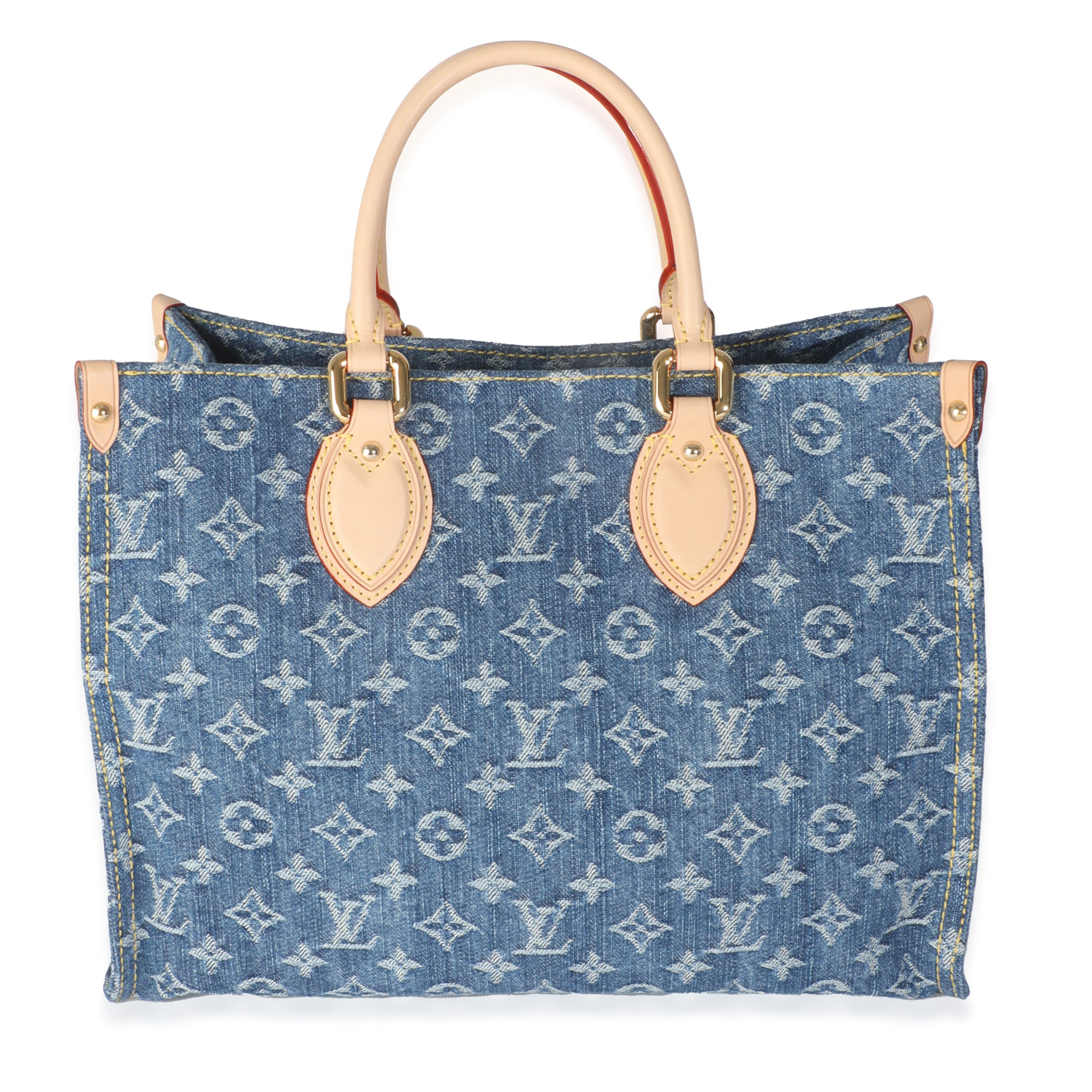 Listing Title: Louis Vuitton Blue Monogram Denim Onthego MM
SKU: Z145313
Condition: Pre-owned 
Condition Description: This bag says it all. The Onthego bag from Louis Vuitton is designed for busy lifestyles. Topped with two Toron handles and two