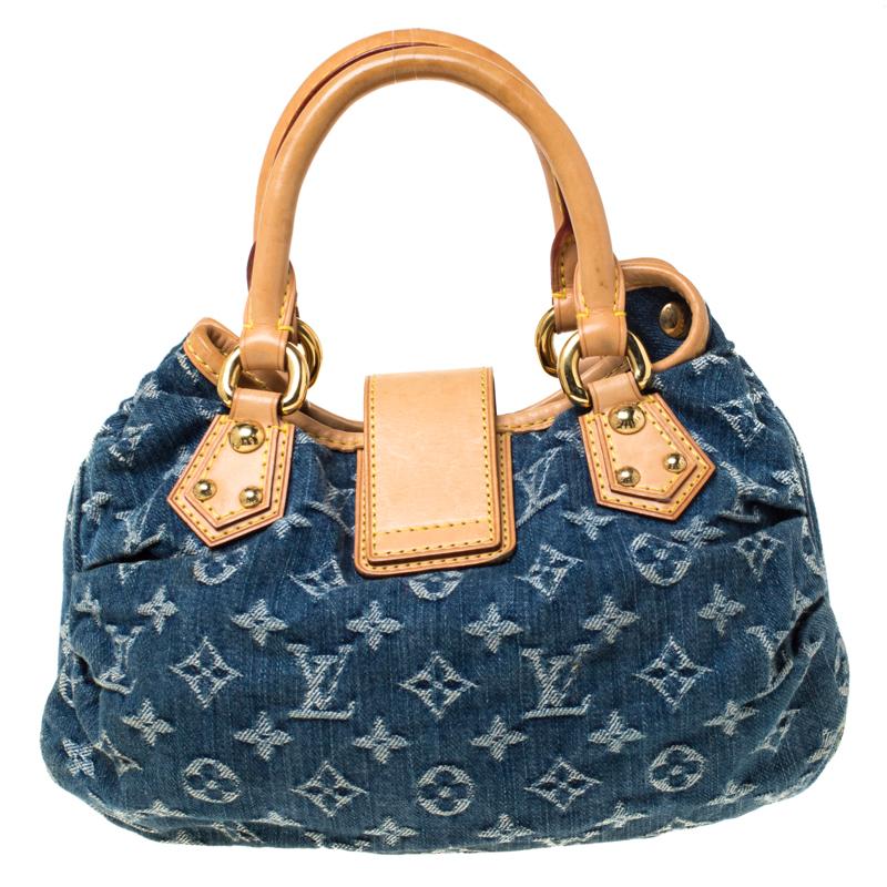 Meticulously crafted from denim in their signature Monogram pattern, this Louis Vuitton Pleaty bag is worth the buy. It has a unique, identifiable shape with two leather handles and a push-lock flap that opens to an Alcantara-lined interior sized to