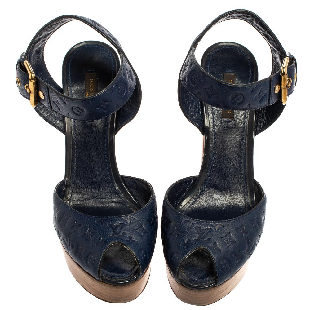Beautifully designed and lovely to look at, this pair of sandals by Louis Vuitton will last you season after season. They are made from monogram Empreinte leather into a peep-toe silhouette and feature ankle fastenings and 12.5 cm heels supported by