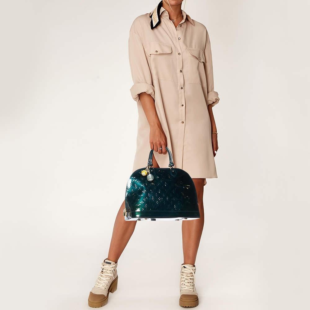 Embrace elegance with the Louis Vuitton Alma GM Bag. Crafted with meticulous attention to detail its rich color and iconic monogram pattern exude timeless allure. The spacious interior and structured silhouette make it a perfect blend of style and