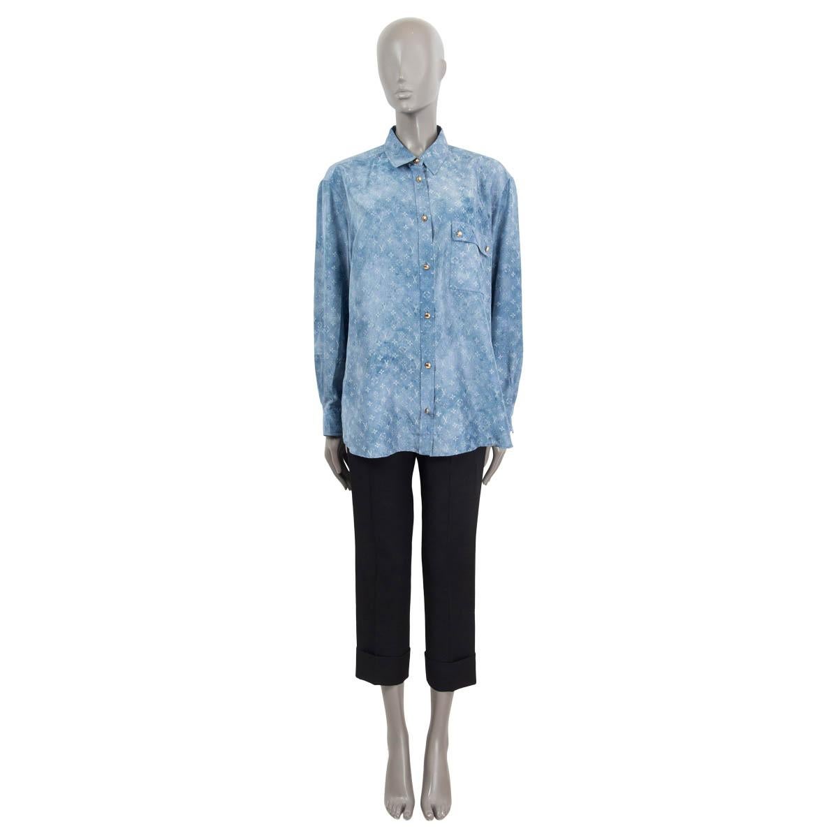 100% authentic Louis Vuitton Monogram Cloud Masculine button-up shirt in blue airy silk twill (100%). Features a flap pocket and boxy fit for a structured utility look. Closes with gold-tone buttons. Has been worn and is in excellent