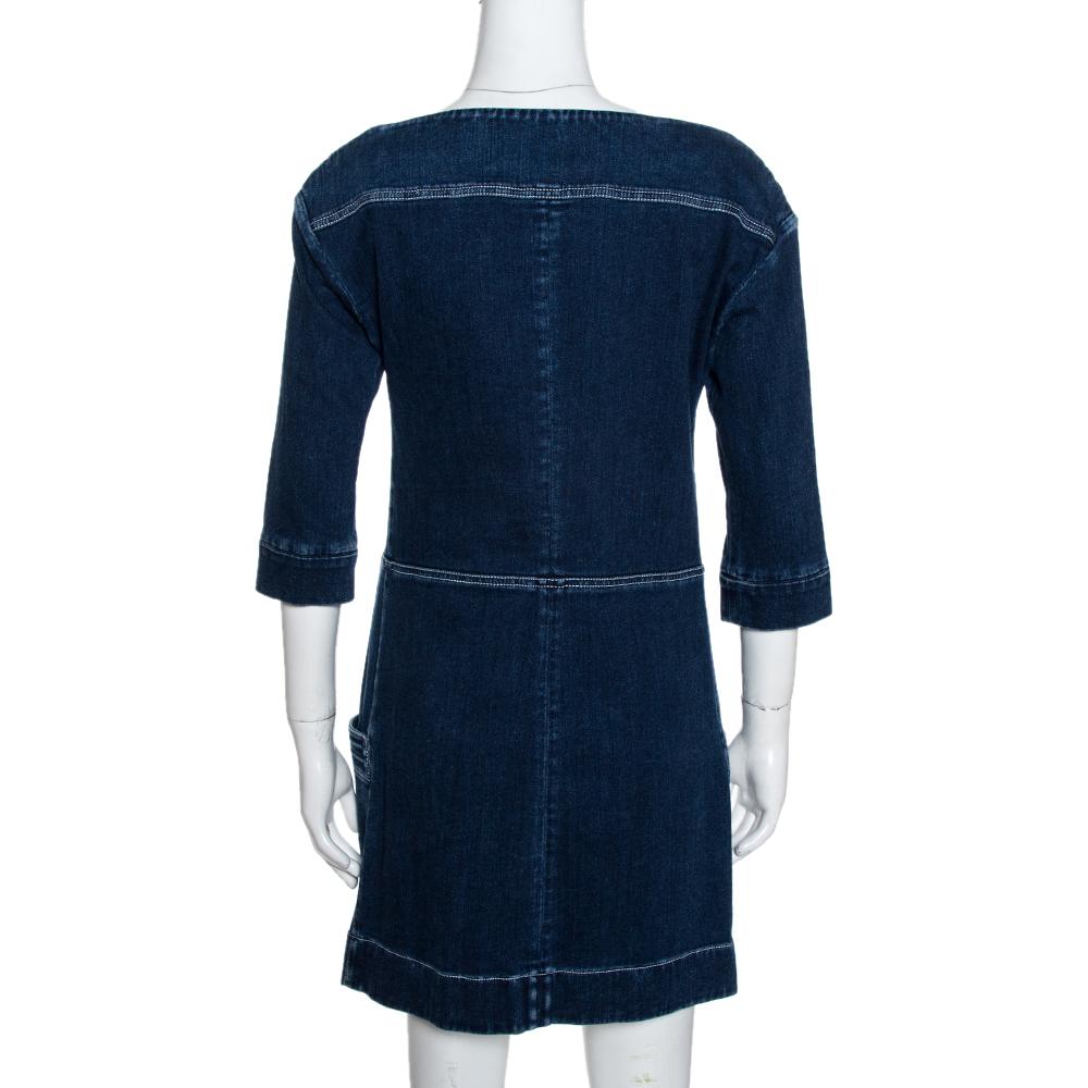 Grab this attractive dress from Louis Vuitton and look classy and perfect for every event. Blue in color, the dress is tailored from denim fabric with two pockets on the front. It would make you look just gorgeous.

