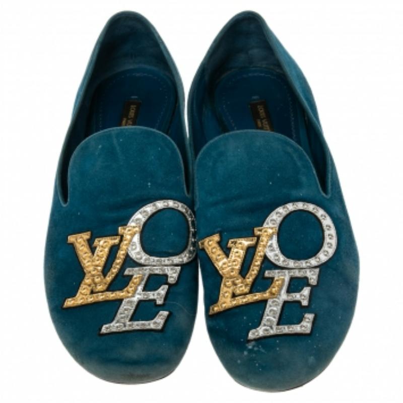 Lend a luxurious appeal to your casuals with these chic loafers from Louis Vuitton. Crafted from suede and designed with 'LOVE' logo accents on the uppers, they offer a good fit and a perfect choice when you want comfort and style.