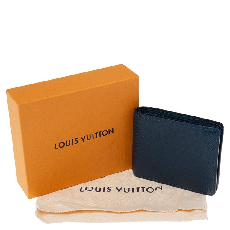 Louis Vuitton Blue Taiga Leather Multiple Wallet at 1stDibs