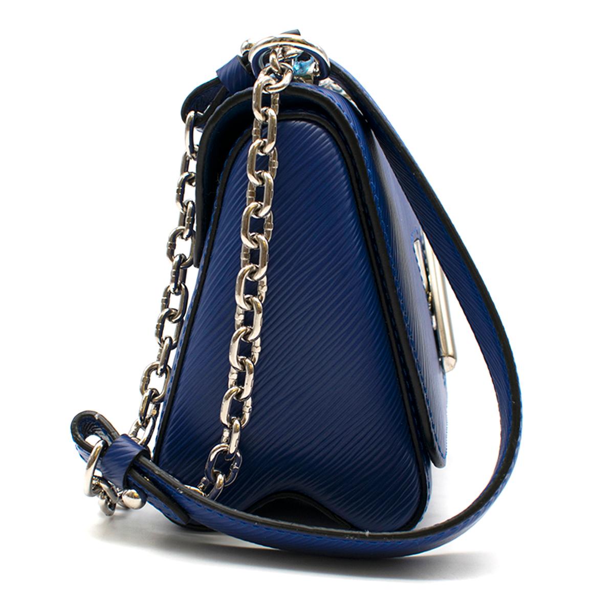 Louis Vuitton Blue Twist PM  Epi Leather Mini Shoulder Bag

- Blue, leather shoulder bag
- Silver-tone hardware
- Iconic LV twist lock
- Suede lining 
-  Chain shoulder strap with leather pad
- Inside flat pocket with removable mirror
- Large inside