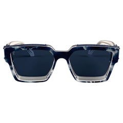 LOUIS VUITTON Lunettes de soleil en acétate marbré bleu blanc