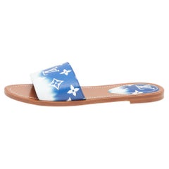 Mules plates Escale Lock It Louis Vuitton en toile monogrammée bleue/blance, taille 38