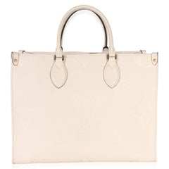 Louis Vuitton Creme Giant Monogram Empreinte Onthego MM