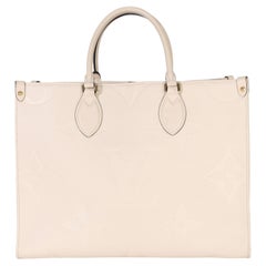 Louis Vuitton Creme Giant Monogram Empreinte Onthego MM